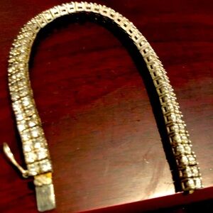 Swarovski crystals bracelet with 925 sterling gold washed sing 2 rows. Beautiful